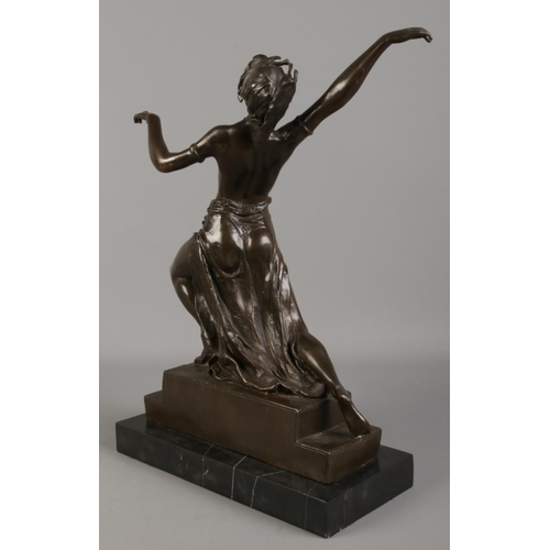 3 - In the style of Bruno Zach; A bronze figure of a young maiden in dance. Raised on marble plinth. 38c... 