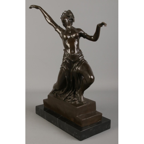 3 - In the style of Bruno Zach; A bronze figure of a young maiden in dance. Raised on marble plinth. 38c... 