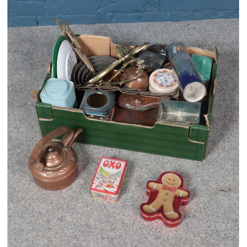 254 - A box of miscellaneous including collectable tins such as Oxo, a copper pan set and ceramic plates f... 