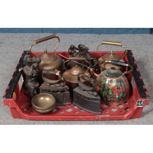 286 - A collection of mainly metalwares. Includes copper kettles, irons and composite figures.