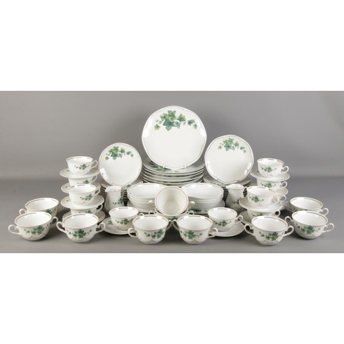 301 - An extensive collection of Fiesta Fine Porcelain dinnerwares in the ivy leaf pattern. To include din... 