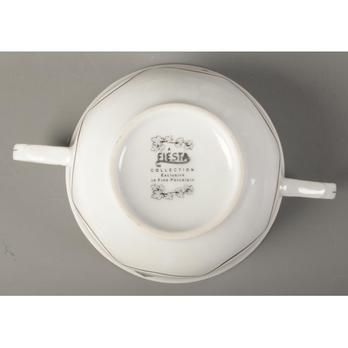 301 - An extensive collection of Fiesta Fine Porcelain dinnerwares in the ivy leaf pattern. To include din... 