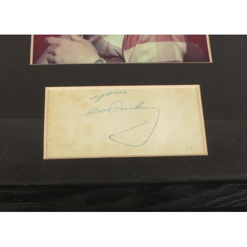 34 - A framed Elvis Presley autograph along with photograph. Dimensions including frame 25cm x 33.5cm.