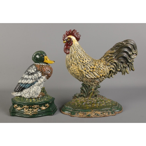 37 - Two painted cast metal door stops; Mallard and Cockerel. Tallest: 31cm.