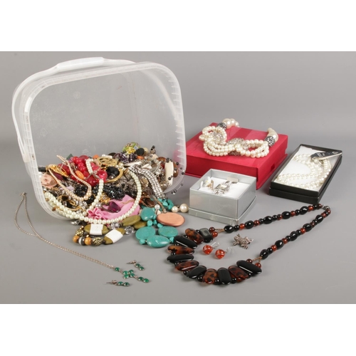 38 - A very large collection of costume jewellery, to include necklaces, silver jewellery suite, marcasit... 