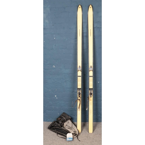 316 - A pair of vintage Kneissl 'White Star' skis, in carry bag with label attached for the 'Earl of Liver... 