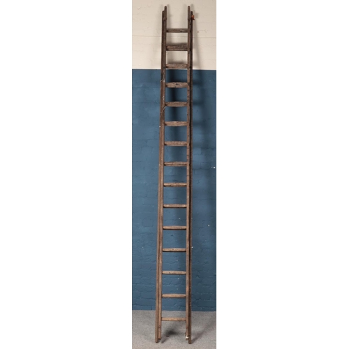 319 - A set of A.Bratt & Sons wooden ladders.