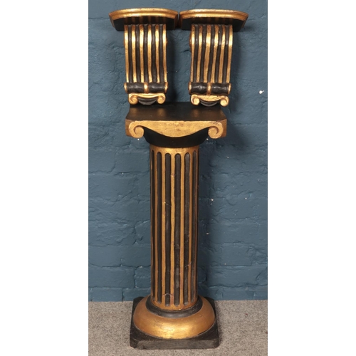 320 - A black and gold painted wooden column, together with two matching wall brackets. Height of column: ... 