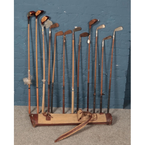 344 - A quantity of vintage golf clubs. Including Barkers, Winton, etc.