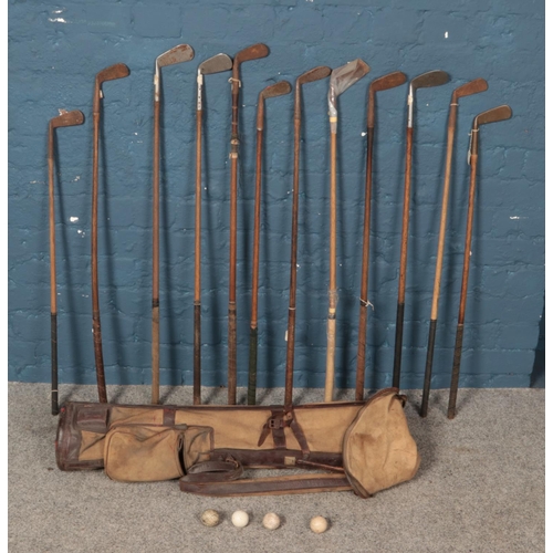 347 - A quantity of vintage golf clubs. Including Thistle,  Tom Gillies, Maxwell Mashie, Halley putter, Sp... 