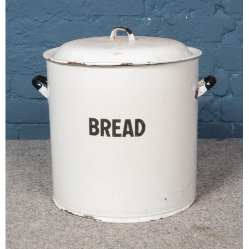 350 - A large enamel bread bin with lid. Approx. dimensions 37cm x 40cm diameter (not including handles)