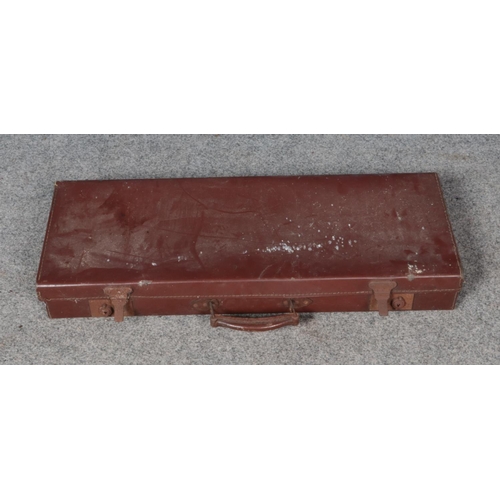 354 - A long leather suitcase. Approx. 74cm x 29cm x 10cm.