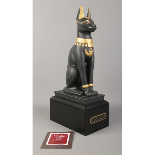 52 - A Franklin Mint black porcelain figure on titled plinth - 'Guardian of the Nile', with certificate. ... 