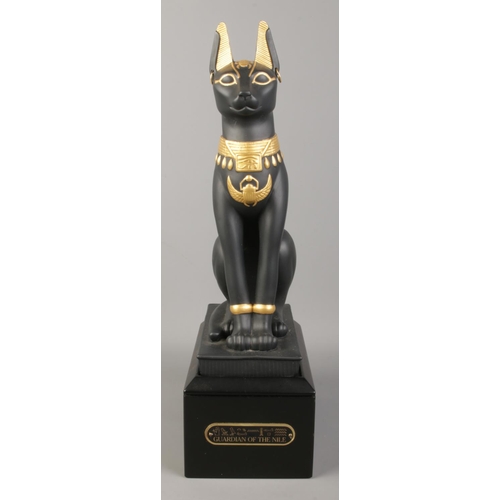 52 - A Franklin Mint black porcelain figure on titled plinth - 'Guardian of the Nile', with certificate. ... 