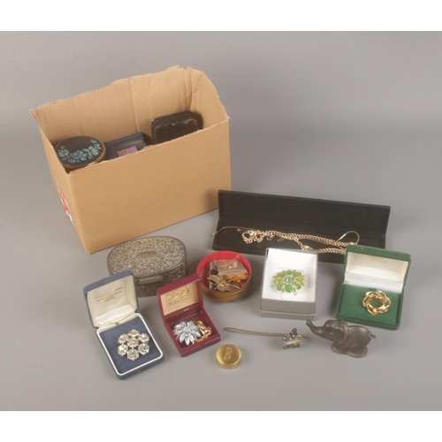 6 - A box of assorted costume jewellery mainly consisting of necklaces and brooches, most boxed.