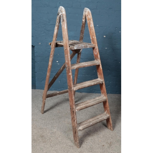 380 - A set of Twyford wooden step ladders.