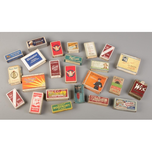 64 - A collection of vintage dummy tobacco and cigarette packets.