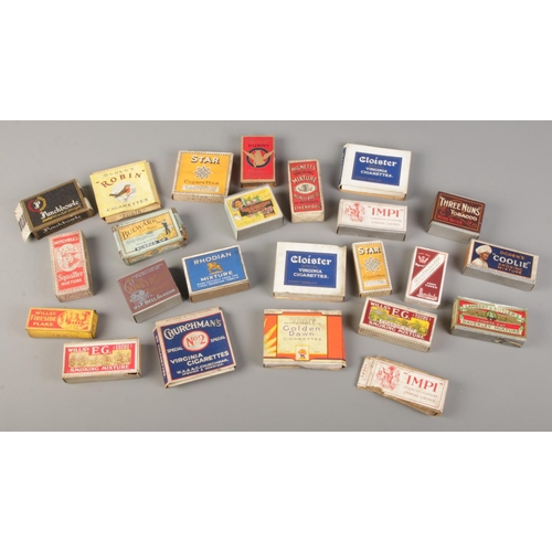 66 - A collection of vintage dummy cigarette and tobacco packets.