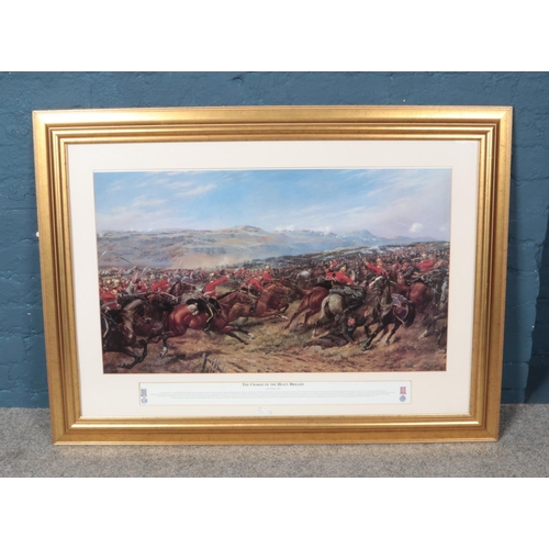 396 - A G.D Giles framed print titled The Charge of The Heavy Brigade depicting historical Crimean War sce... 