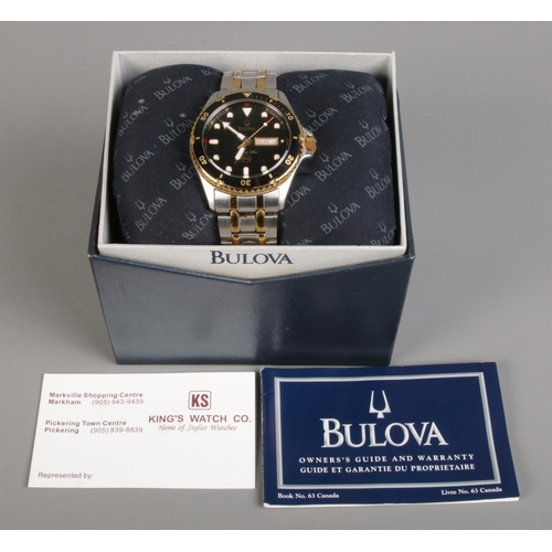 455 - A boxed Gent's Bulova Marine Star quartz wristwatch, with French/English day and date windows on bla... 