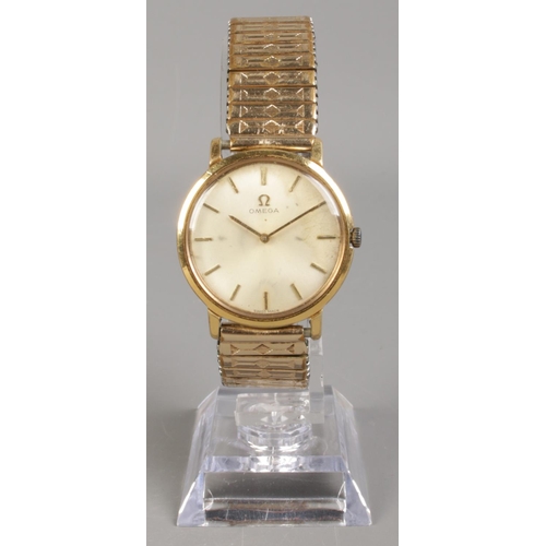 456 - A Gent's gold plated Omega automatic wristwatch, on rolled gold expanding strap. With silvered dial ... 