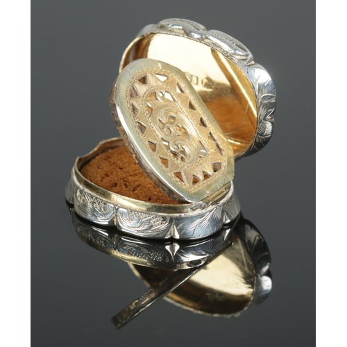 458 - A Victorian silver vinaigrette of oval form, with pierced interior, sponge, engine turned decoration... 