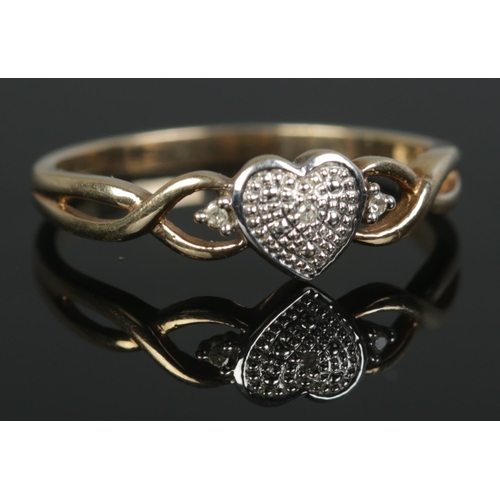 474 - A 9ct Gold and Diamond heart ring. Size P. Total weight: 1.64g.