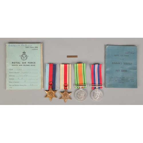 480 - Four WWII medals and ribbons. Including The Defence Medal, War Medal, Africa Star, The 1939-1945 Sta... 