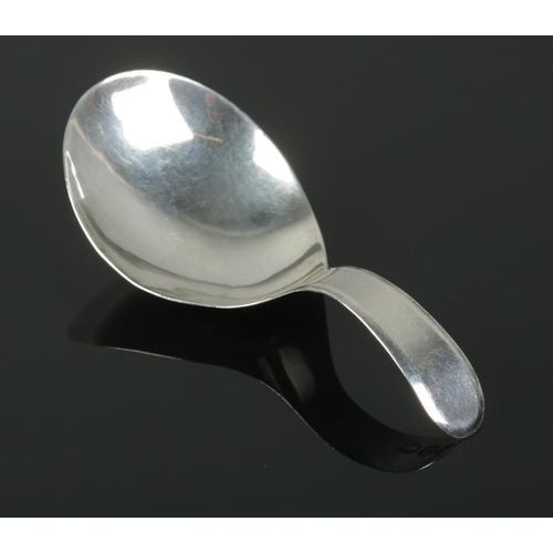 486 - A George III silver caddy spoon. Assayed for 1811, by Josiah Snatt. Total weight: 5.63g