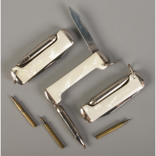 499 - Three Richards folding pen knives with pen function.