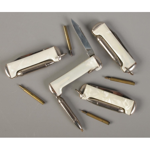 500 - Four Richards folding pen knives with pen function.