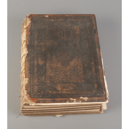 81 - A William Collins & Sons family bible condensed by Rev. John McFarlane. Badly damaged spine.