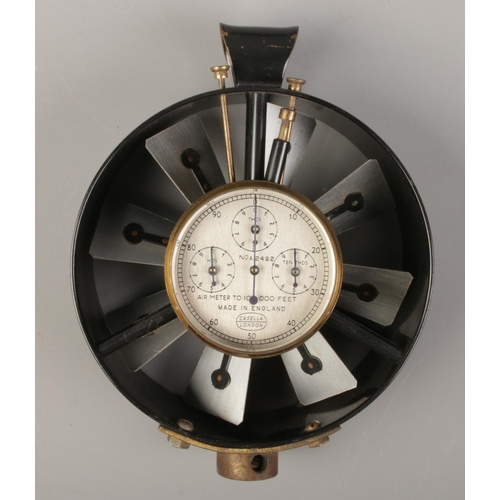 513 - A cased Casella air meter. With silvered dial and three subsidiary dials. No A 2492.