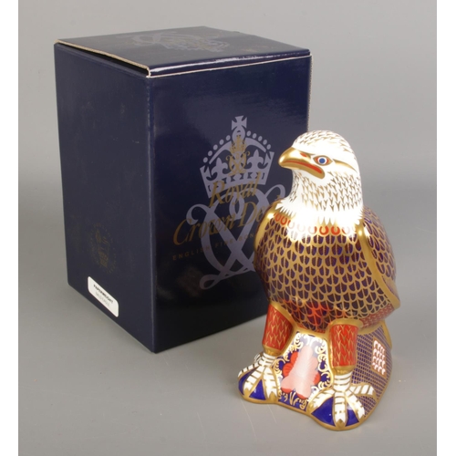 526 - A Royal Crown Derby paperweight formed as an Eagle. With silver stopper.