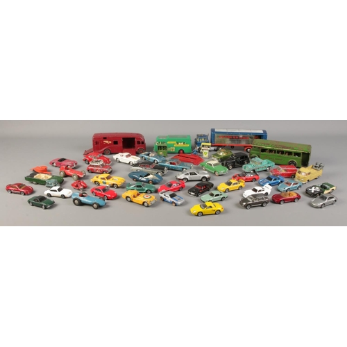 90 - A good collection of play-worn vintage die cast vehicles. To include Corgi Monte-Carlo Mini Cooper S... 