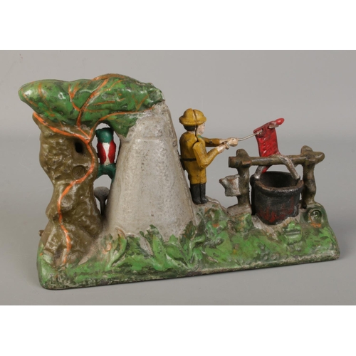 91 - A novelty cast iron money box 'Boy Scout Camp'.