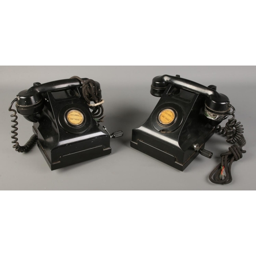 93 - Two vintage hand crank telephones.