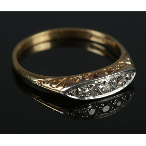 346 - An early 20th century 18ct gold & platinum diamond five stone boat set ring. Size N. 2.97g.