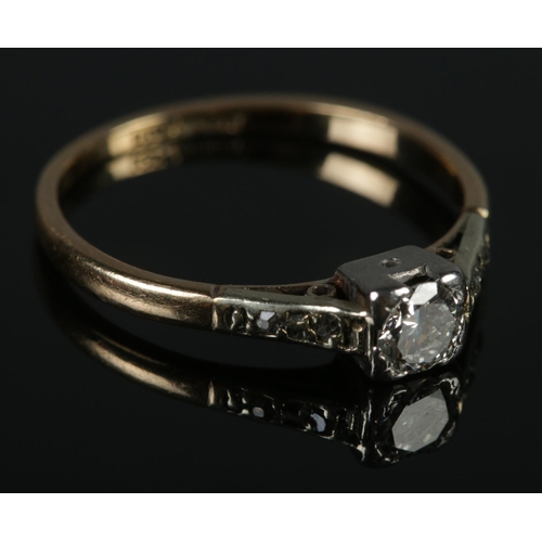 348 - An 18ct gold & platinum diamond solitaire ring. Size L .2.02g.