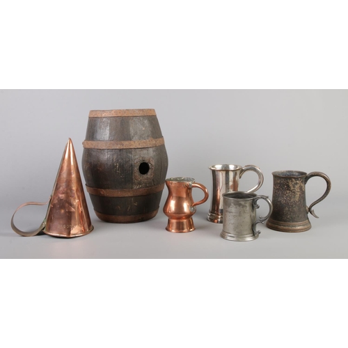 129 - A Victorian costrel/bevy barrel along with a collection of antique breweriana. Includes copper ale w... 