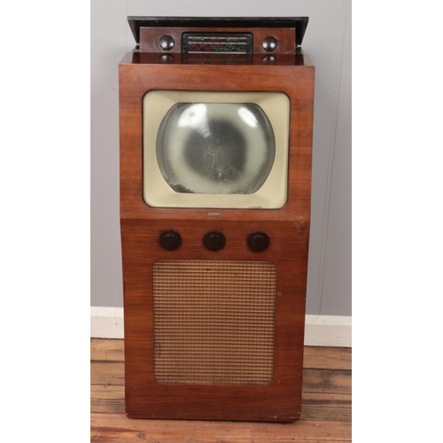 504 - A vintage AC Cossor Television/Radio, raised on casters. Model 924.