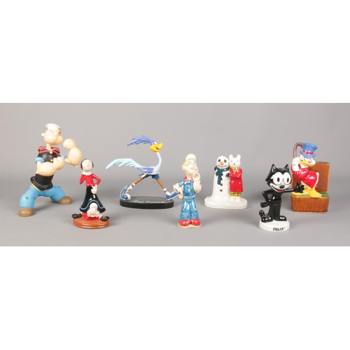 105 - A collection of assorted cartoon figures, To include Roadrunner, Limited Edition Popeye figure and R... 