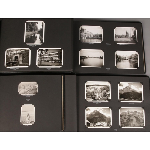 109 - Four albums of monochrome photographs of the world. Including Denmark, Sweden, Egypt, Netherlands, e... 