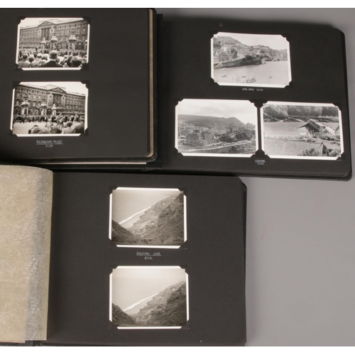 113 - Three albums of monochrome photographs of the world. Including Great Britain, Devon & Cornwall, Buck... 