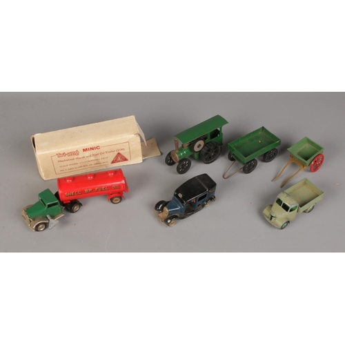 132 - A Tri-Ang Minic Clockwork Fuel and Oil Trailer along with Taxi. Also Dinky truck and other unmarked ... 