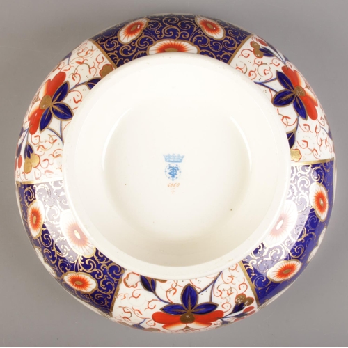 133 - A Taylor Tunnicliffe salad bowl and servers, together with a similar teapot, both in Imari colours.