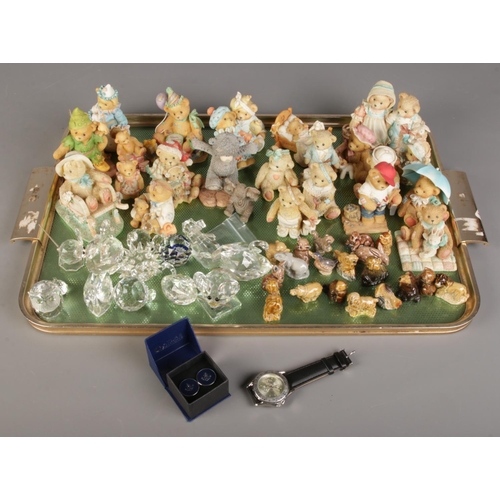 139 - A tray of assorted collectables. Includes Cherished Teddies, Atlas Editions watch and cufflinks, Swa... 