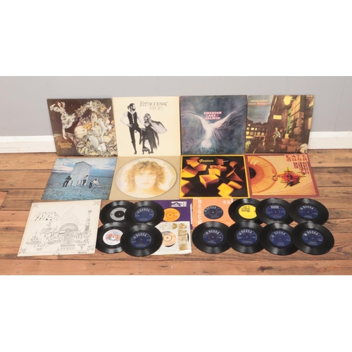 145 - A quantity of Rock records and singles to include Pink Floyd, David Bowie, Roger Daltrey, Kate Bush ... 