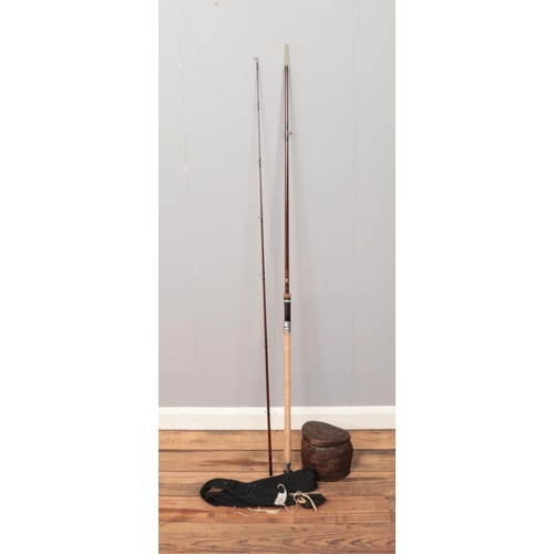 150 - A Bruce and Walker Bruce Spinner fishing rod with original fabric storage bag. Also includes live ba... 