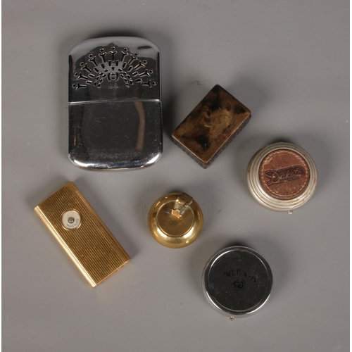 173 - A quantity of collectables including Ronson gold plated lighter, chrome handwarmer and selection of ... 